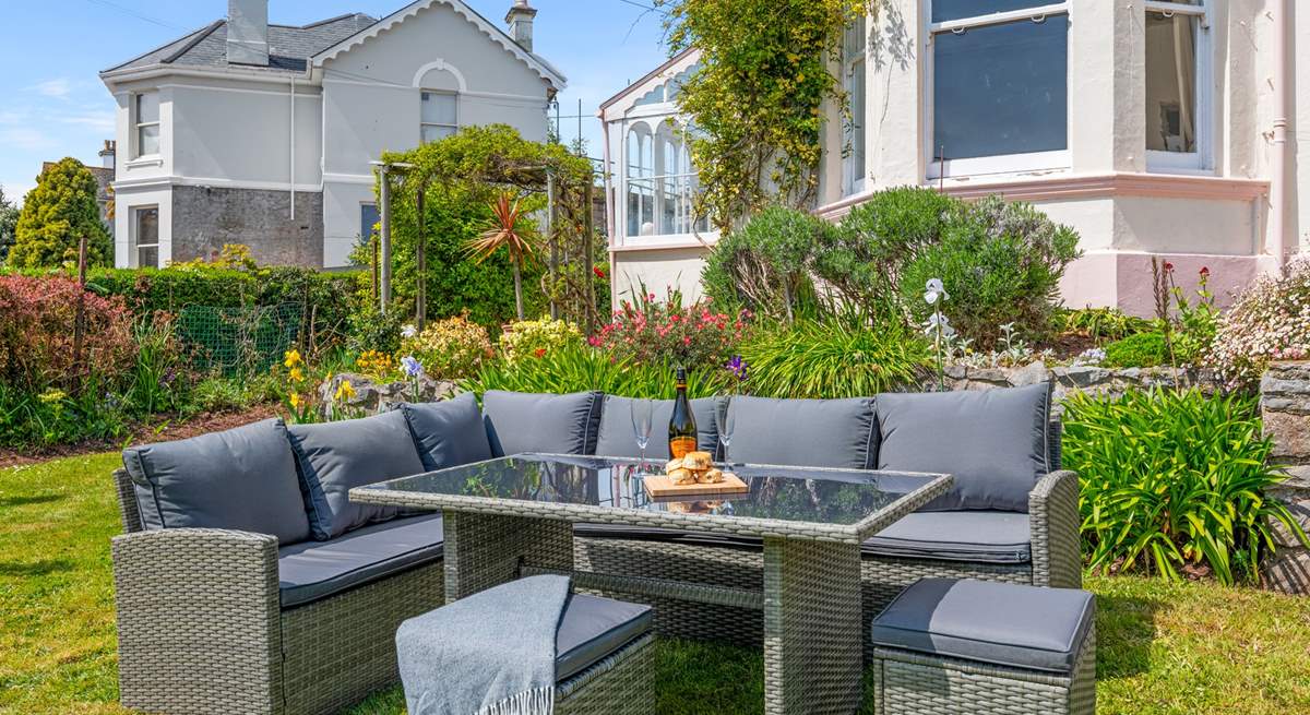 The outdoor furniture provides a great spot to settle down and enjoy a glass of something special.