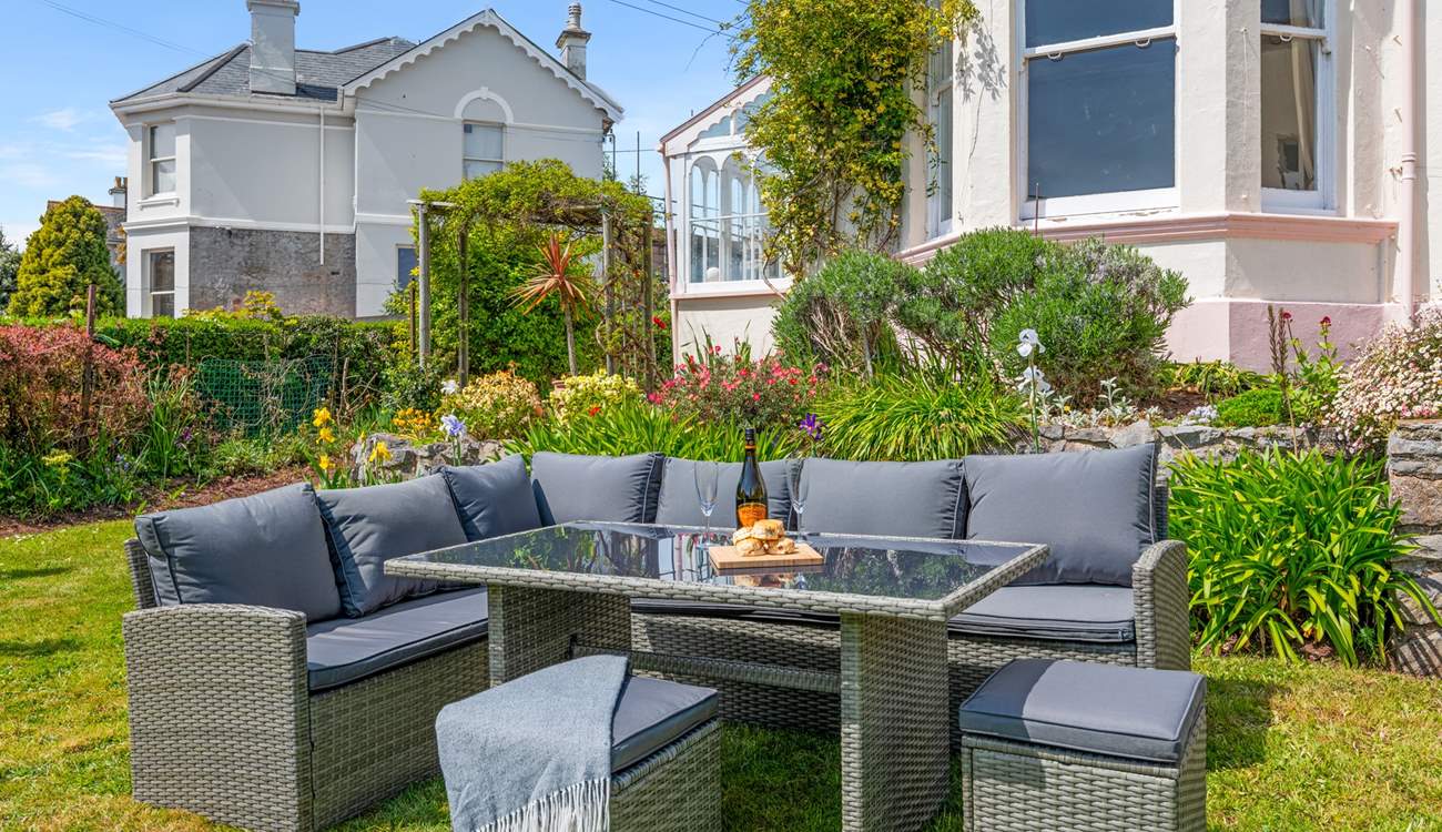 The outdoor furniture provides a great spot to settle down and enjoy a glass of something special.