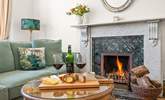 Get cosy in the evenings around the lavish fireplace. - Thumbnail Image