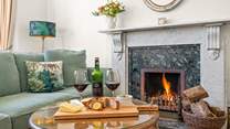 Get cosy in the evenings around the lavish fireplace.