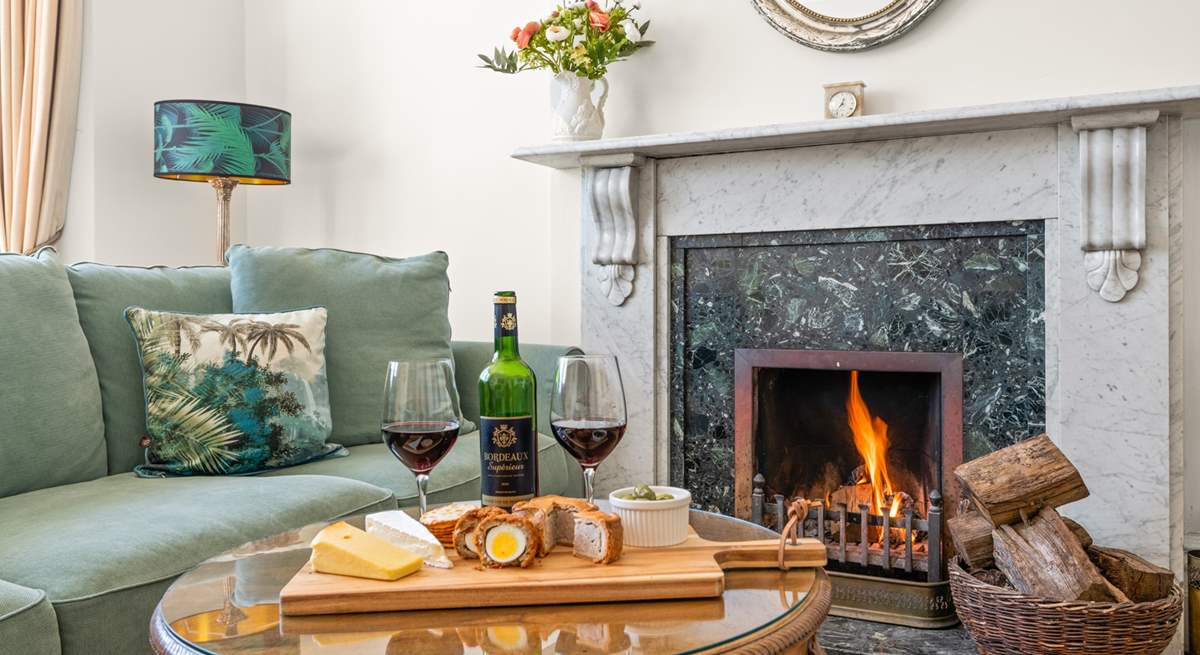 Get cosy in the evenings around the lavish fireplace.