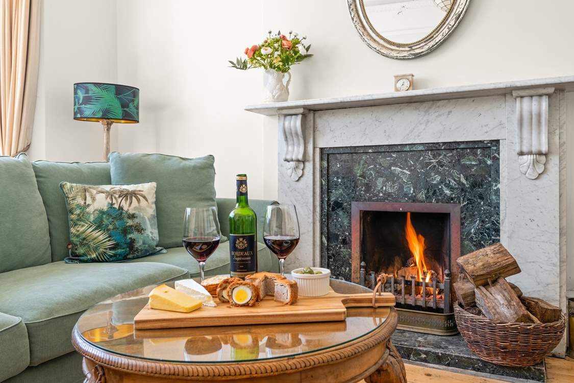 Get cosy in the evenings around the lavish fireplace.