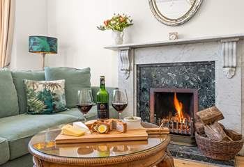 Get cosy in the evenings around the lavish fireplace.