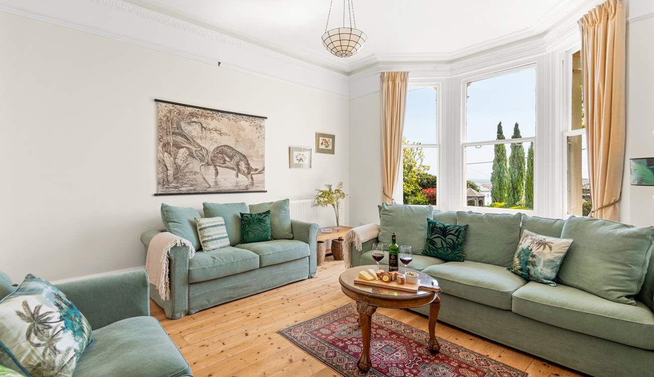 The light and airy sitting-room is a superb place to relax and take in the views.