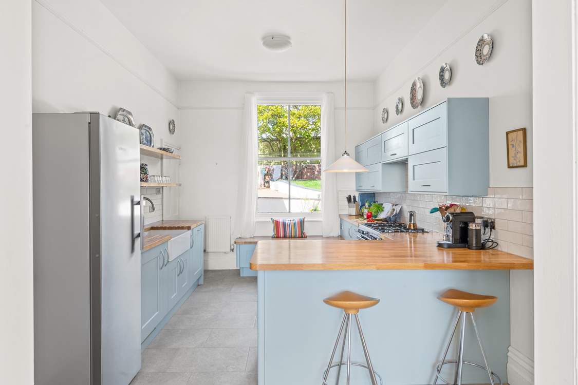 The house is filled with natural light from the magnificent Victorian windows.