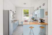 The house is filled with natural light from the magnificent Victorian windows.