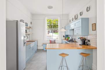 The house is filled with natural light from the magnificent Victorian windows.