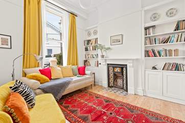 The charming snug, also acts as a mobility friendly bedroom, offering a day bed with access to the ground floor wet-room.