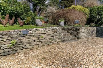 Follow the path from the parking area through the communal garden to Lavender Lodge.