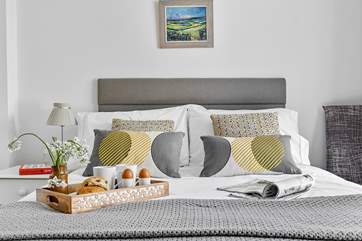 The perfect cosy spot to recharge with more beautiful art painted by the talented owner.