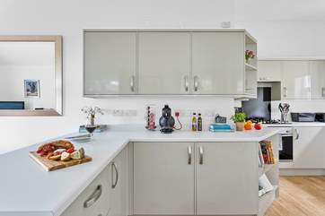 The stylish kitchen is beautifully designed.
