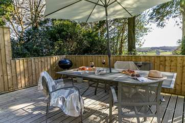 Lavender Lodge has a stunning private raised deck and garden with fabulous countryside views.