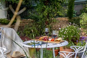 Sit surrounded in the peace, tranquility and sweet smelling lavender of the communal garden.
