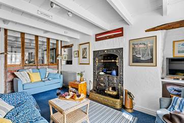 The traditional ornamental range takes pride of place in the sitting-room (not for guests' use).