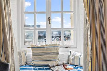 The window seat provides the perfect spot to watch the world go by.