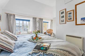 The bedroom to the front of the cottage has twin beds which can be pushed together to make a six-foot bed.