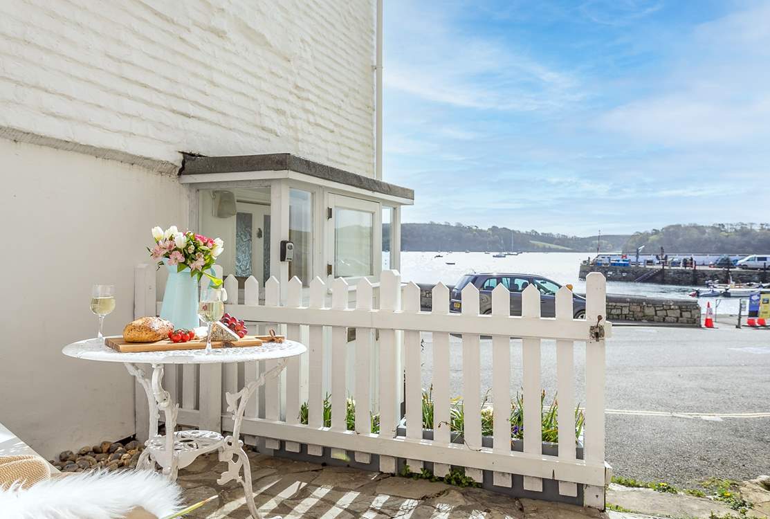 The courtyard has views of the pretty harbour.
