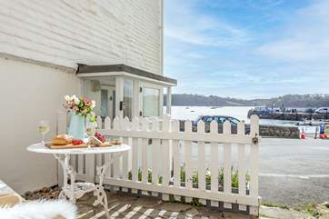 The courtyard has views of the pretty harbour.