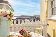 This is the view from your very cute front courtyard, the harbour is almost within touching distance.