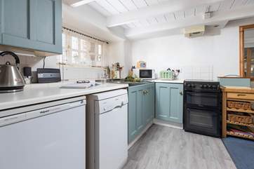 The kitchen sits at the rear of the cottage.