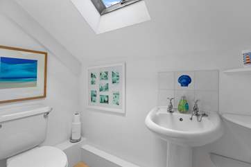The separate WC and basin. Please mind the step.