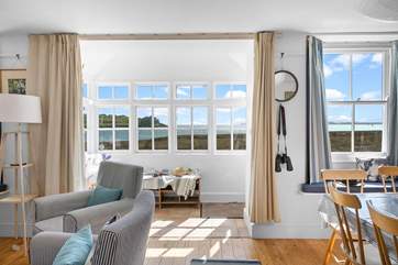 The morning sun lights the living-room.