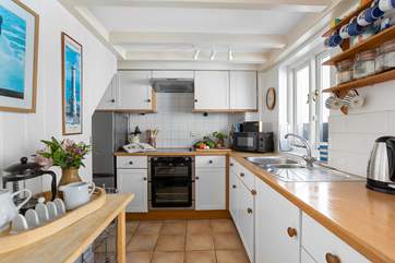 The functional kitchen has all you need including the all-important dishwasher.