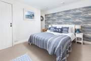 With a pretty nautical theme, the double bedroom is a delight.