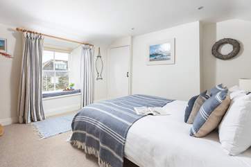 The double bedroom on the first floor has lovely views over St Mawes harbour.