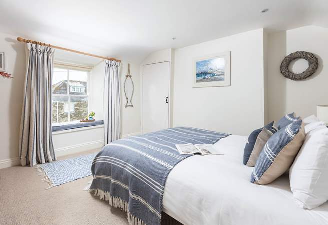 The double bedroom on the first floor has lovely views over St Mawes harbour.