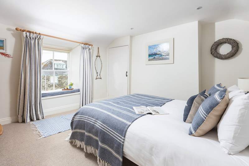 The double bedroom on the first floor has lovely views over St Mawes harbour.