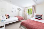 Oh so pretty, the twin bedroom is perfect for either children or adults.