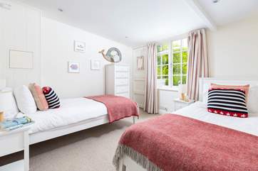 Oh so pretty, the twin bedroom is perfect for either children or adults. The stable-door leads into the rear garden.
