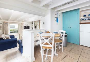 The ground floor is open plan with three steps to the kitchen/diner.