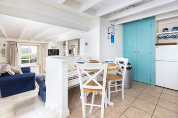 The ground floor is open plan with three steps to the kitchen/diner.