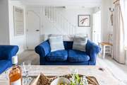 Snuggle up in front of the wood-burner for a cosy night in.
