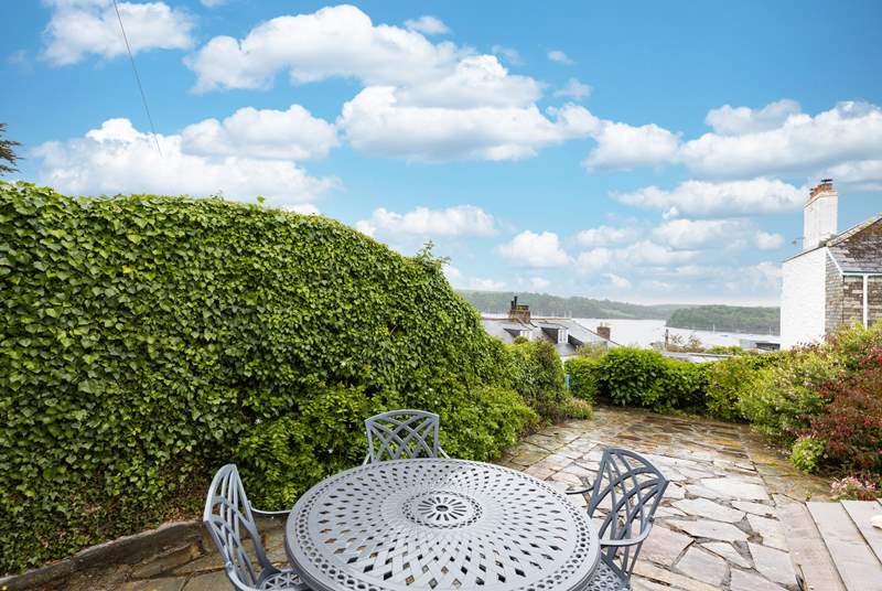 The front patio shares the same stunning view over the harbour and beyond to Place and St. Anthony headland.