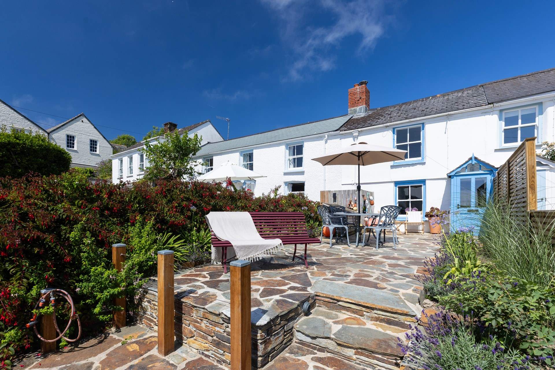 Steps lead up to Little Cottage. 