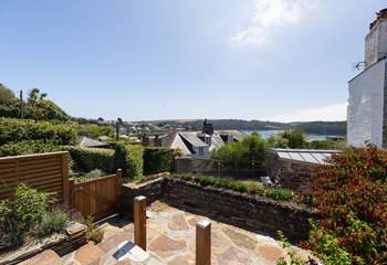 The front patio shares the same stunning view over the harbour and beyond to Place and St. Anthony headland.