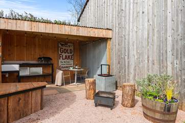Enjoy evenings together, cooking dinner atop the rustic fire-pit.