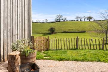 A delightfully stripped back fence frames views across the valley.