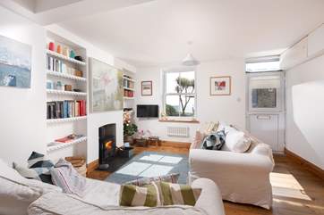 A light and airy front room welcomes you as you enter.
