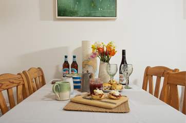 Indulge yourself at the homely dining-table.