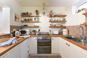 Cook up a storm in the well-equipped kitchen.
