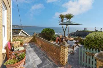 The wonderful patio garden is the perfect place to enjoy the sunshine.