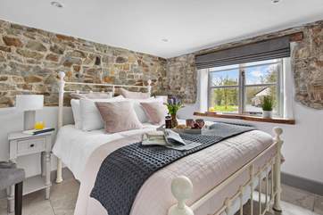 The Granary has reverse level living and the bedroom is on the ground floor.