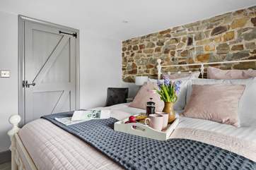 The bedroom is a simply gorgeous space.