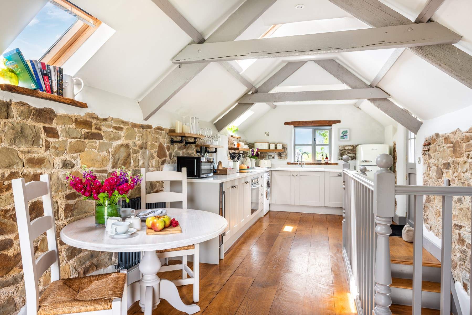 Head upstairs to the open plan living space.