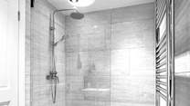 The sleek shower-room for a refreshing shower after a busy day.