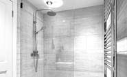 The sleek shower-room for a refreshing shower after a busy day.